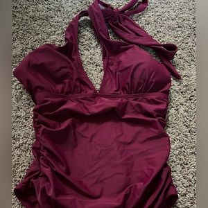 Women’s maroon one piece swimsuit